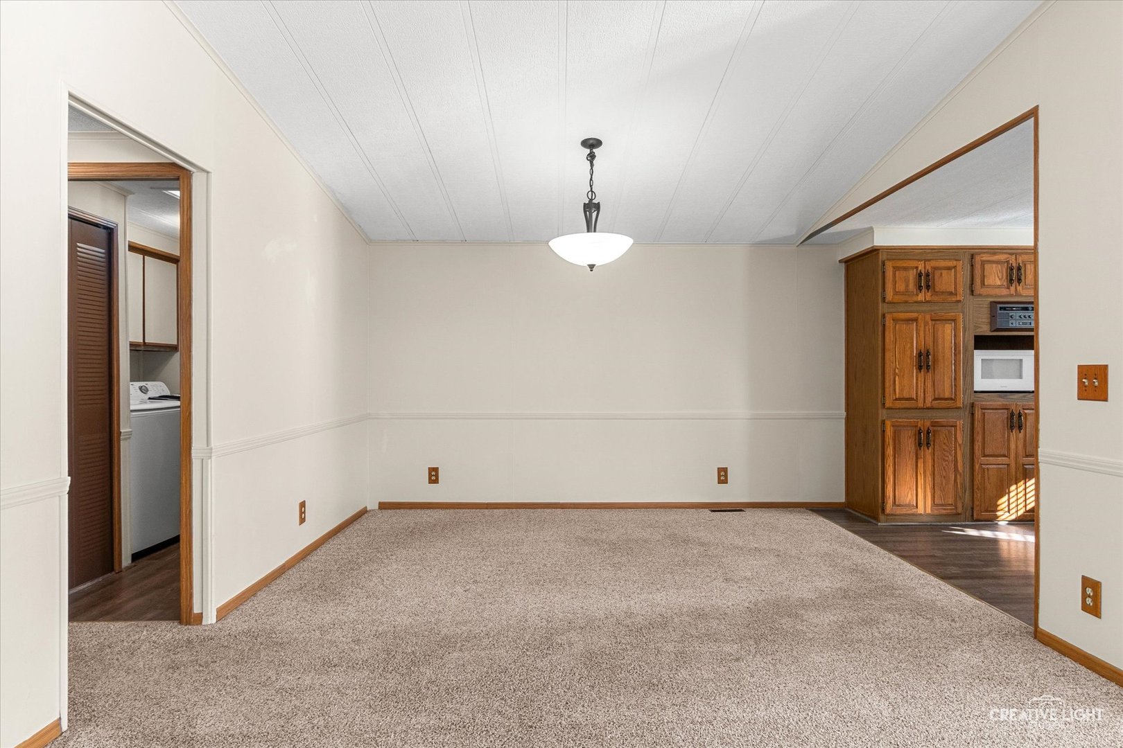 1122 Candida Road Elgin, IL 60123 - Photo 5 of 16 an empty room with chandelier fan
