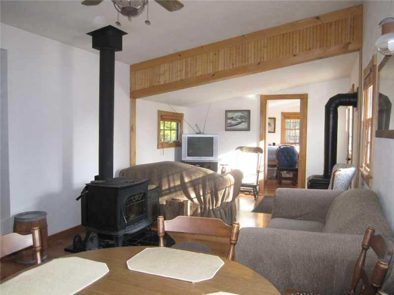 Xx Golding Road Perry, ME 04667 - Photo 8 of 24 Living Room. Harmon Woodstove, wood...
