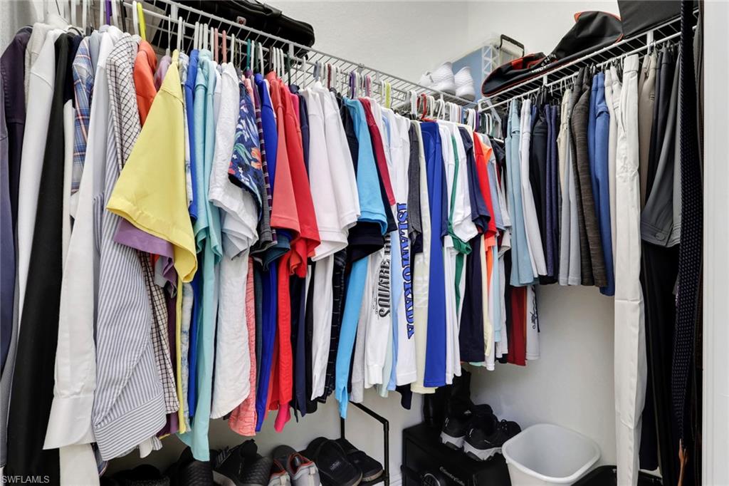 1589 Serrano Circle Naples, FL 34105 - Photo 18 of 38 a view of a walk in closet