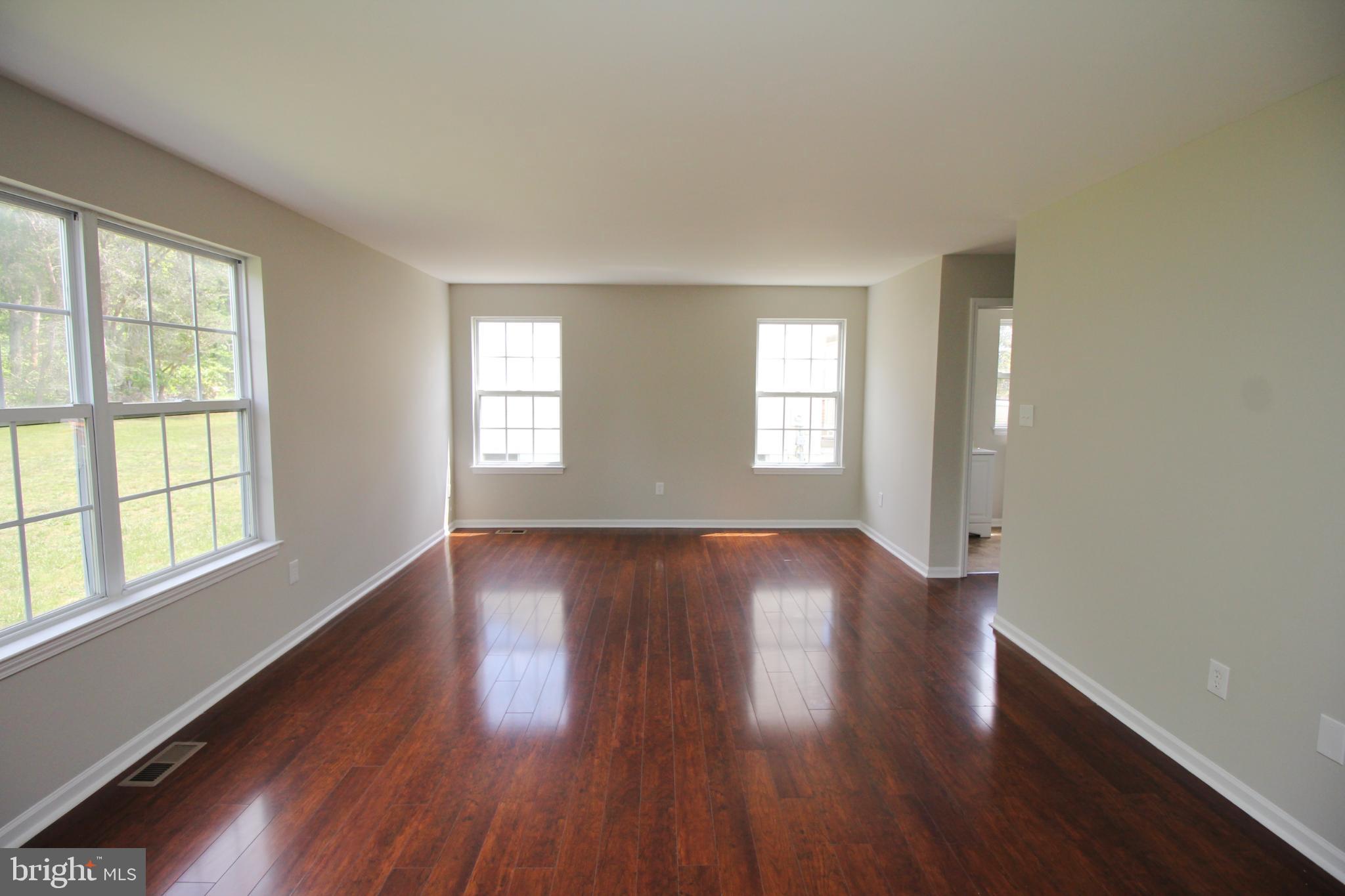 7 Edgewater Court Sicklerville, NJ 08081 - Photo 17 of 44 Bright and airy space with polished floors.