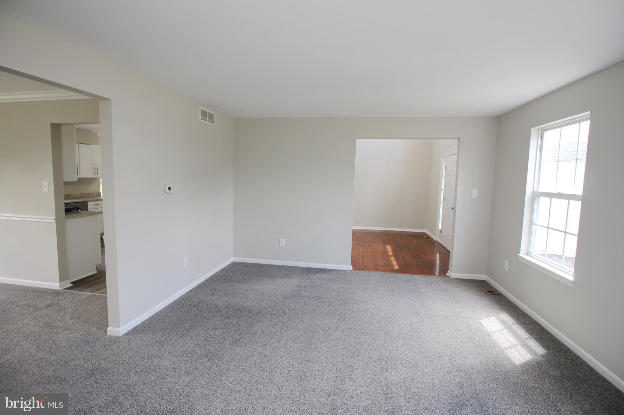 7 Edgewater Court Sicklerville, NJ 08081 - Photo 7 of 44 Spacious, light-filled living area awaits you.