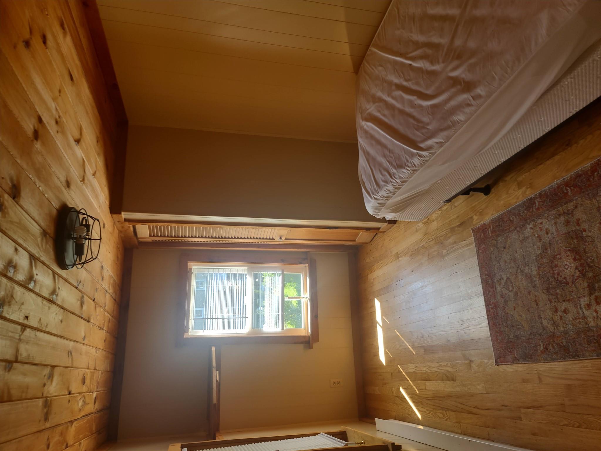 1139 State Rt 17B Mongaup Valley, NY 12762 - Photo 25 of 35 Bedroom featuring hardwood / wood-style flooring and wood ceiling