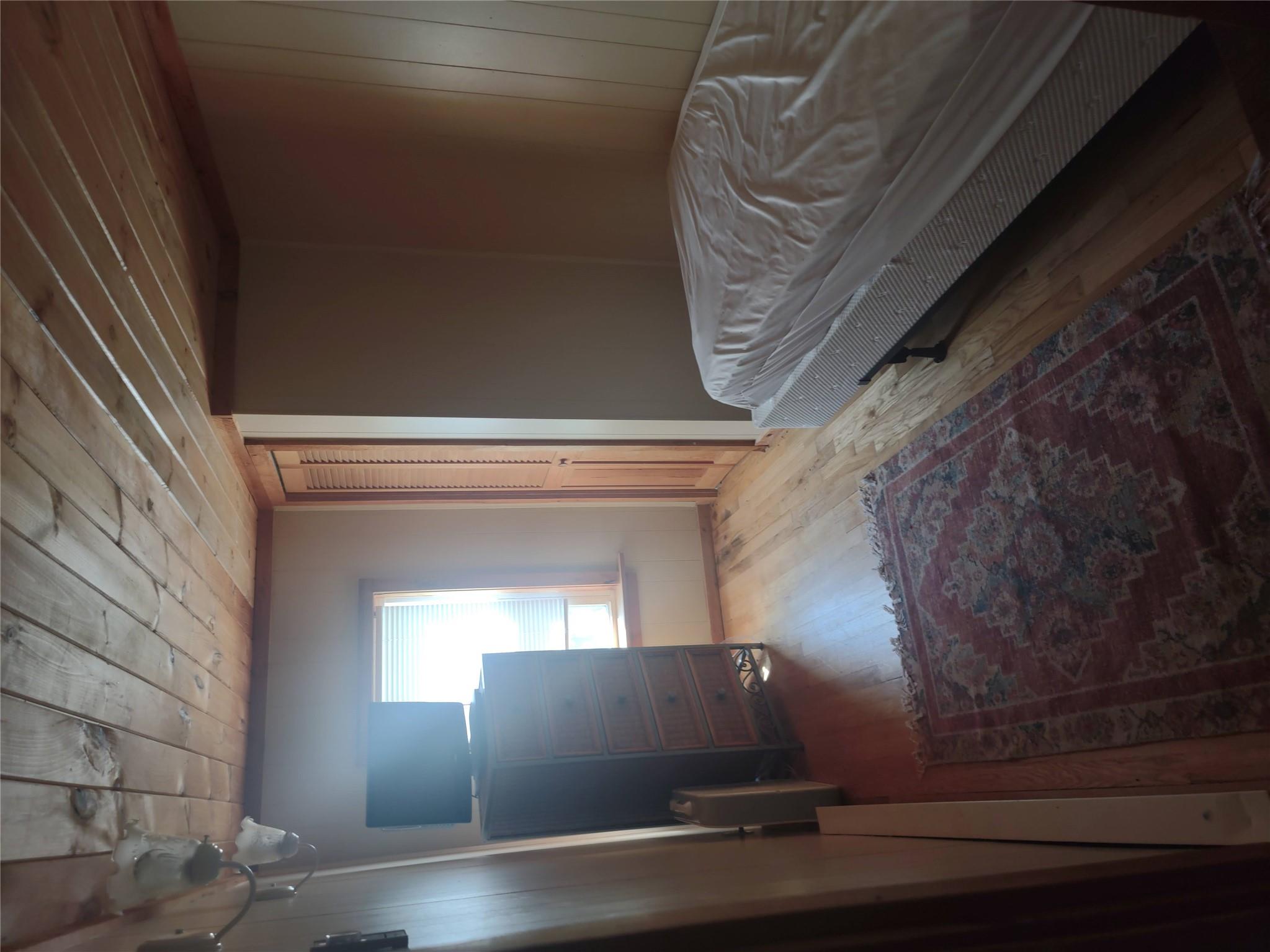 1139 State Rt 17B Mongaup Valley, NY 12762 - Photo 27 of 35 Bedroom featuring wood-type flooring and wood ceiling
