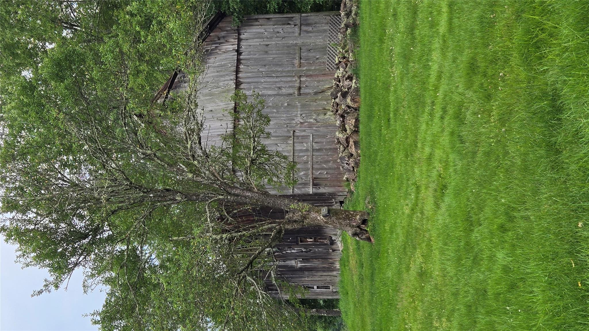 1139 State Rt 17B Mongaup Valley, NY 12762 - Photo 34 of 35 View of green lawn featuring an outbuilding and a barn