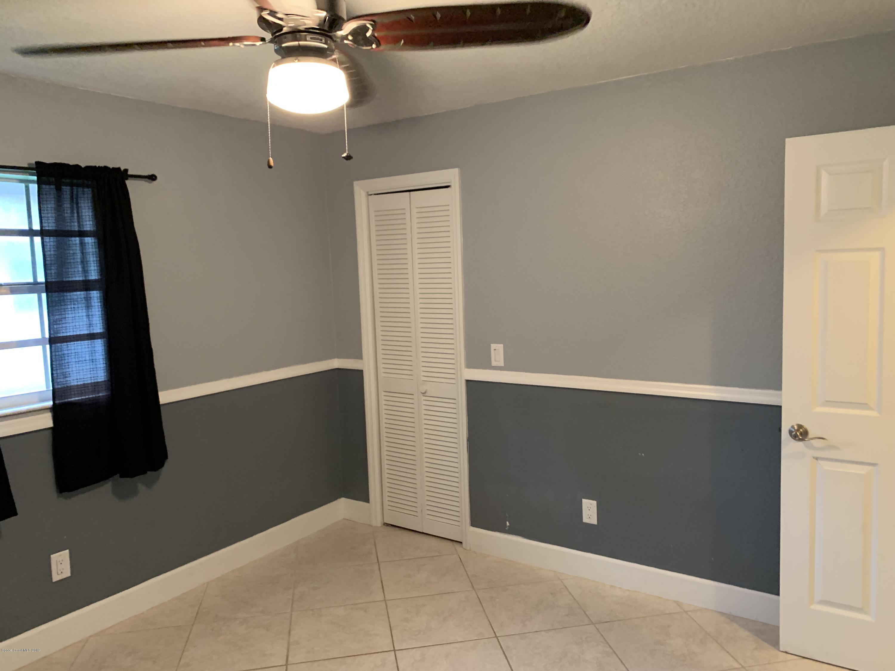 131 13th Avenue Indialantic, FL 32903 - Photo 13 of 23 a view of an empty room and a window