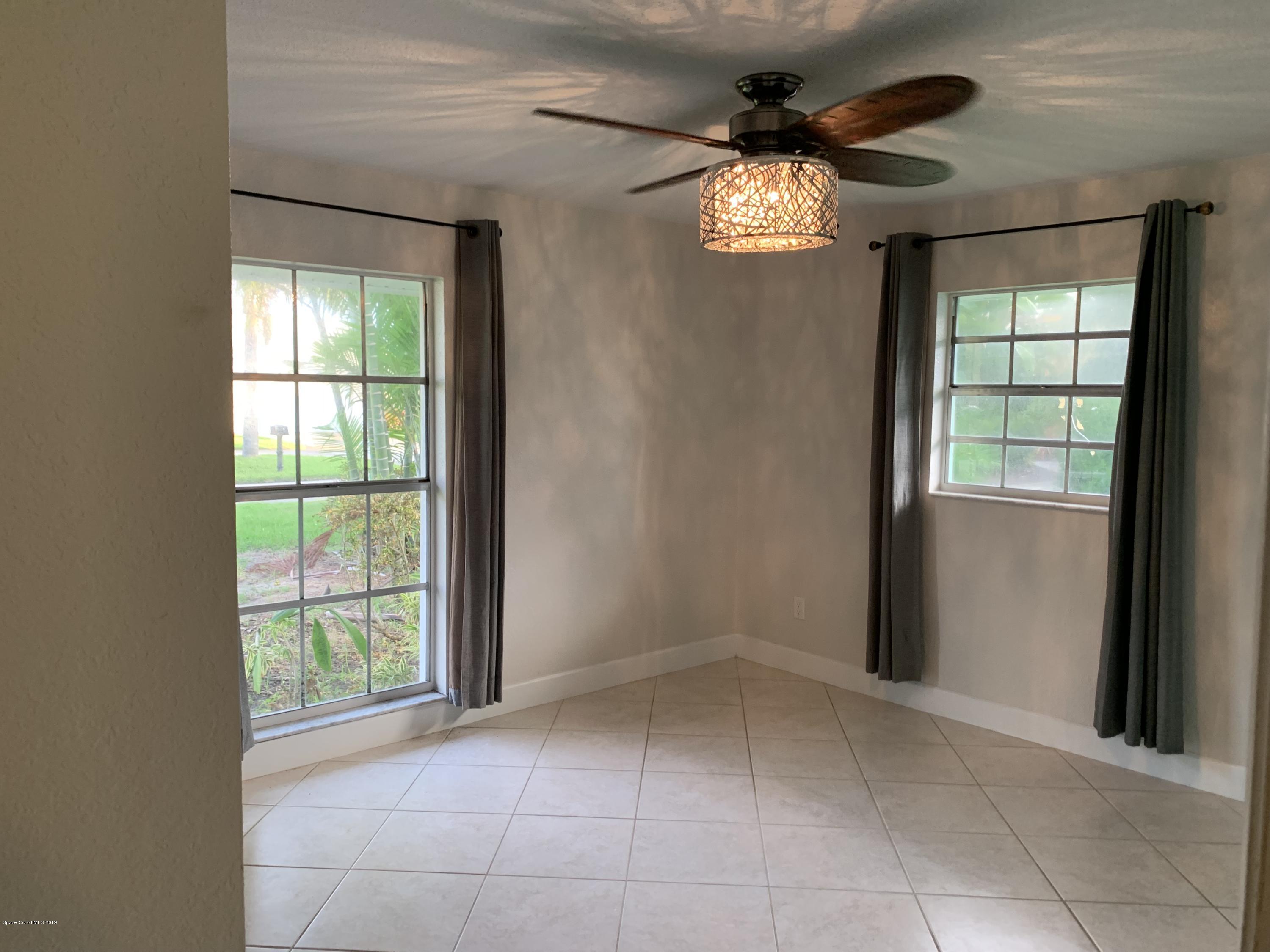 131 13th Avenue Indialantic, FL 32903 - Photo 14 of 23 a view of an empty room with a window
