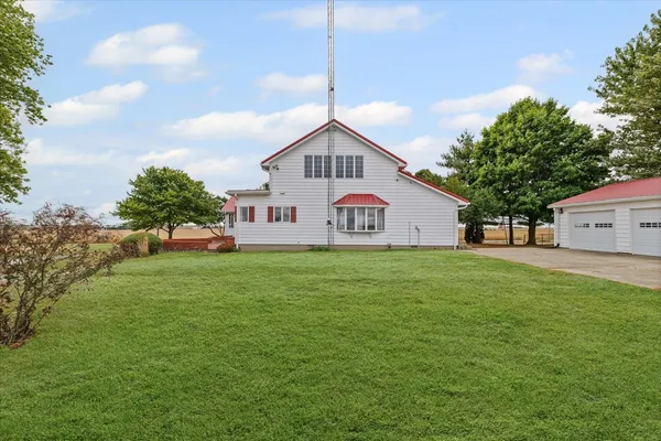 a view of a house with a big yard