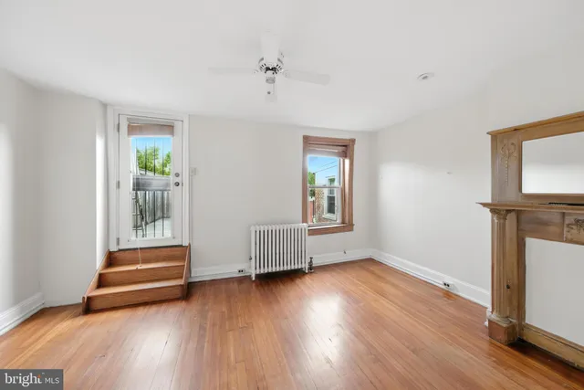 a view of livingroom with hardwood floor and window