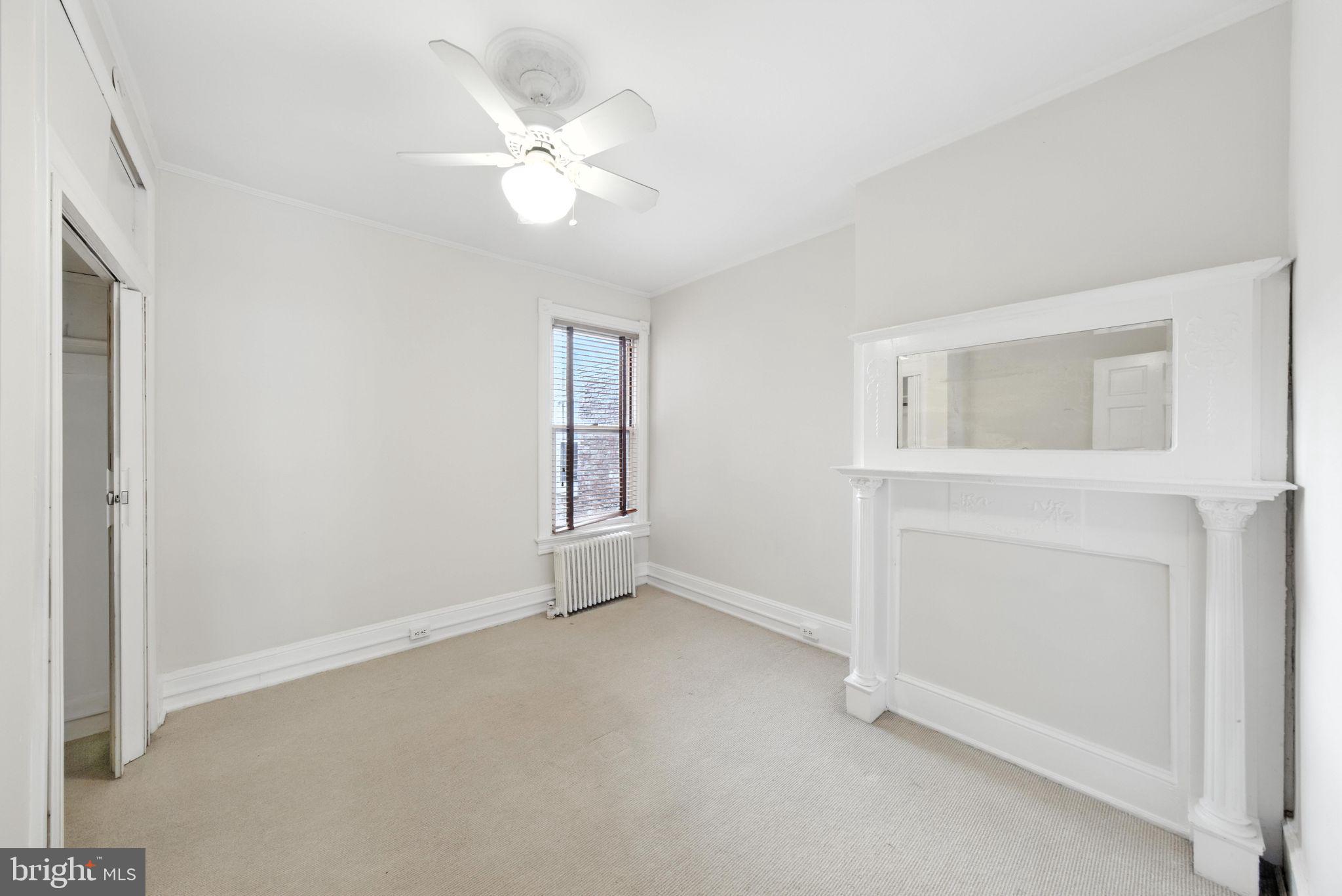 1763 U Street Northwest Washington, DC 20009 - Photo 22 of 28 a view of an empty room with a window
