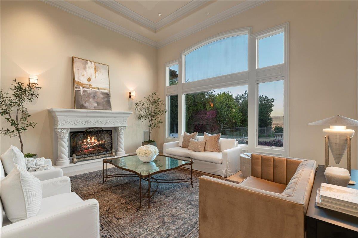8350 Verbena Drive Gilroy, CA 95020 - Photo 13 of 51 a living room with furniture and a fireplace