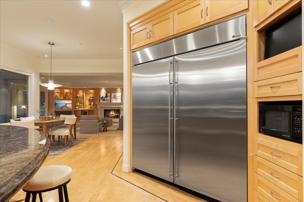 8350 Verbena Drive Gilroy, CA 95020 - Photo 18 of 51 a kitchen with stainless steel appliances refrigerator and table