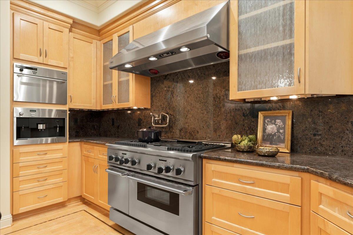 8350 Verbena Drive Gilroy, CA 95020 - Photo 19 of 51 a kitchen with a stove and a microwave