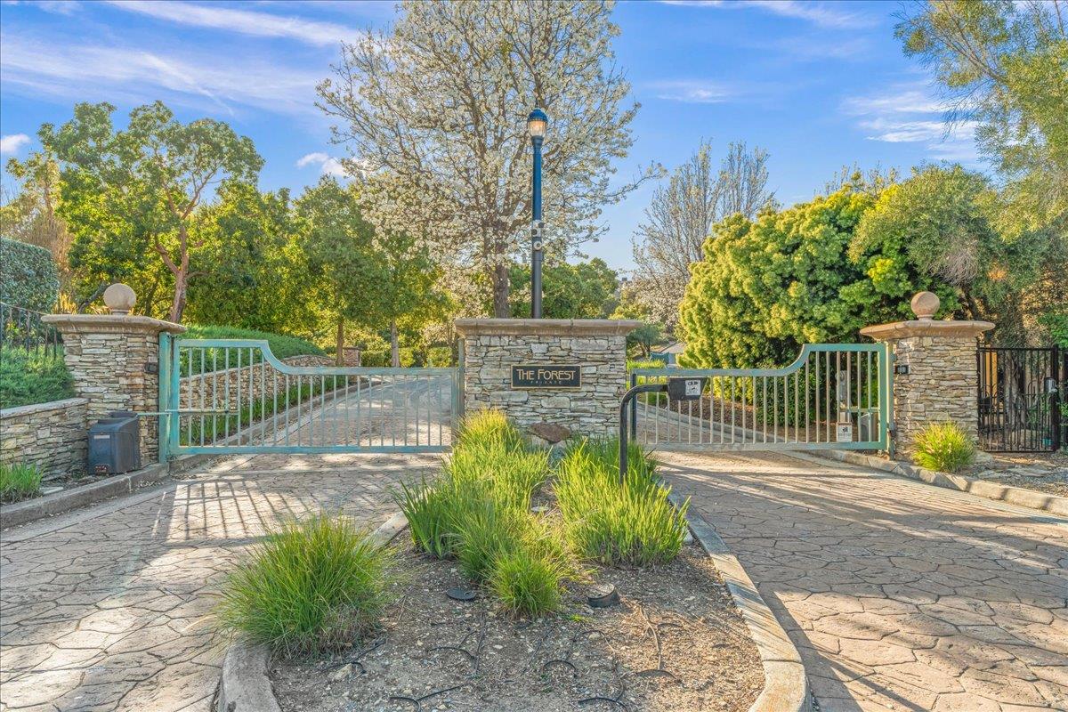 8350 Verbena Drive Gilroy, CA 95020 - Photo 2 of 51 a view of a pathway with a garden