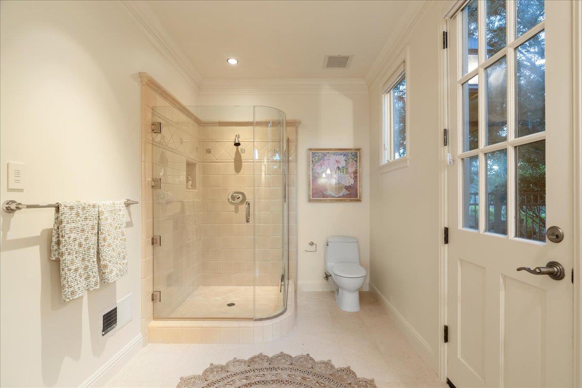 8350 Verbena Drive Gilroy, CA 95020 - Photo 27 of 51 a bathroom with a shower and a toilet