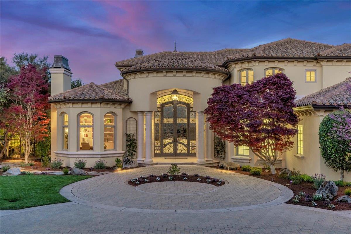 8350 Verbena Drive Gilroy, CA 95020 - Photo 3 of 51 a front view of a house with garden