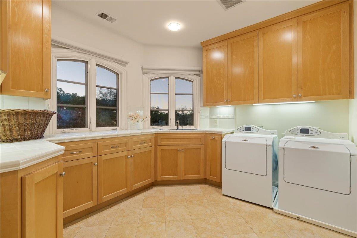 8350 Verbena Drive Gilroy, CA 95020 - Photo 36 of 51 a utility room with dryer and washer