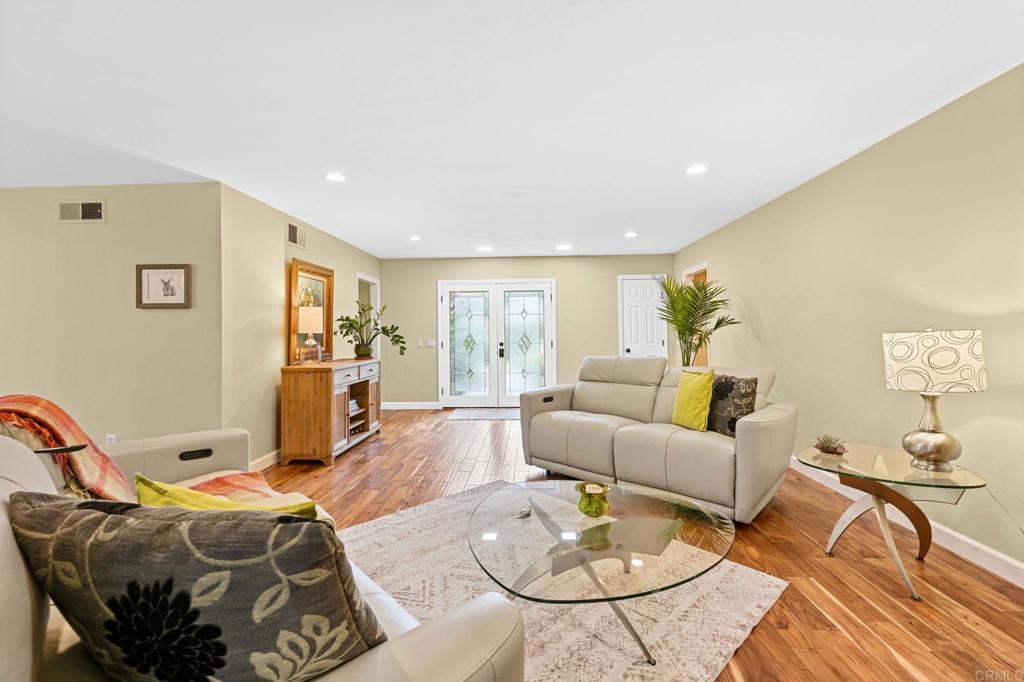 3625 Laketree Drive Fallbrook, CA 92028 - Photo 16 of 52 a living room with furniture and wooden floor