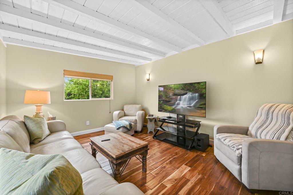 3625 Laketree Drive Fallbrook, CA 92028 - Photo 19 of 52 a living room with furniture and a flat screen tv