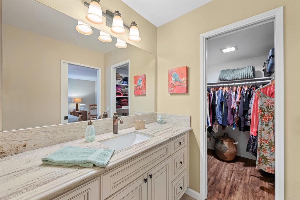 3625 Laketree Drive Fallbrook, CA 92028 - Photo 23 of 52 a bathroom with double vanity sinks a vanity and a shower