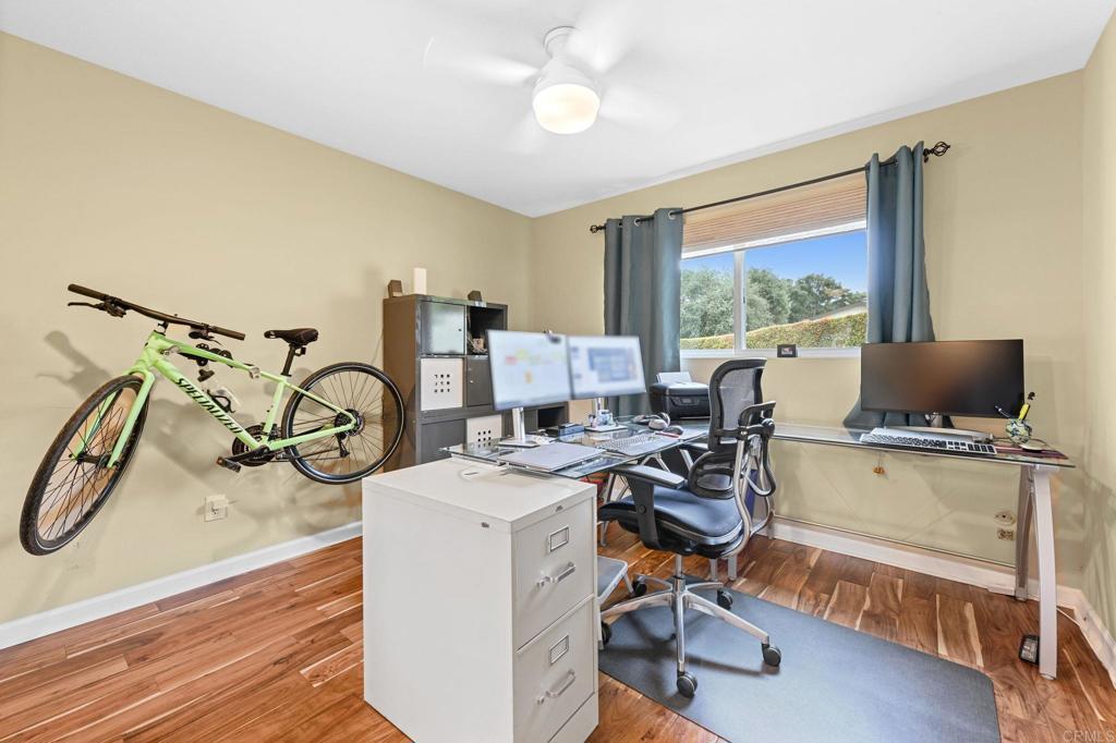 3625 Laketree Drive Fallbrook, CA 92028 - Photo 28 of 52 a view of a workspace with furniture and a window