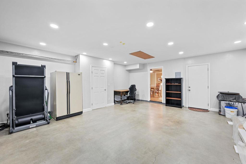 3625 Laketree Drive Fallbrook, CA 92028 - Photo 31 of 52 an empty room with furniture and a flat screen tv