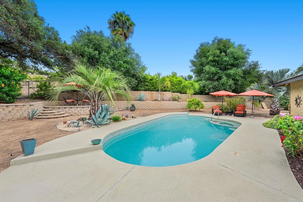 3625 Laketree Drive Fallbrook, CA 92028 - Photo 33 of 52 a view of a swimming pool with a patio