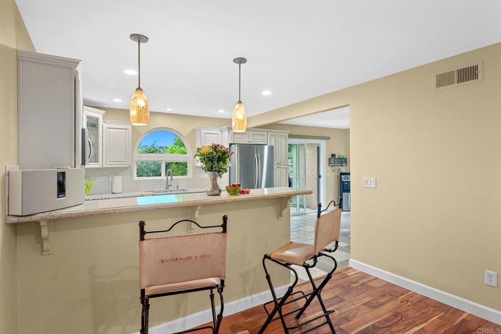 3625 Laketree Drive Fallbrook, CA 92028 - Photo 4 of 52 a kitchen with a sink cabinets and window