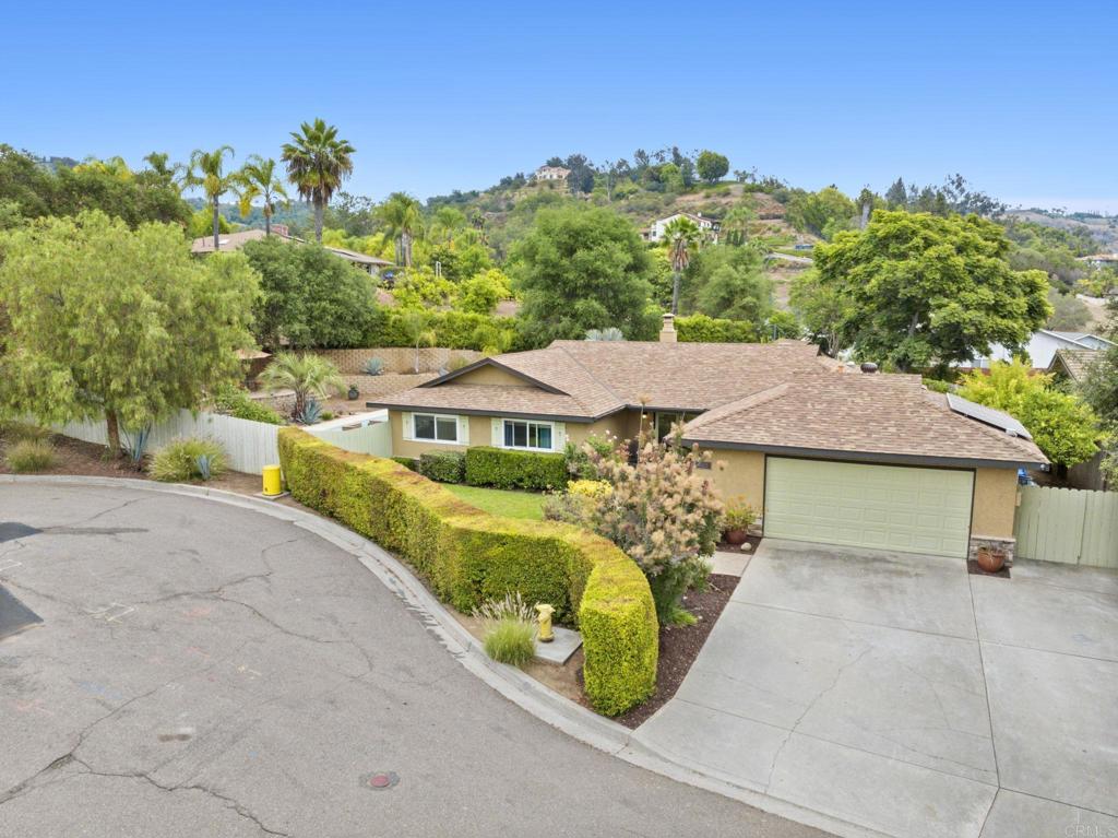 3625 Laketree Drive Fallbrook, CA 92028 - Photo 41 of 52 a house with trees in the background