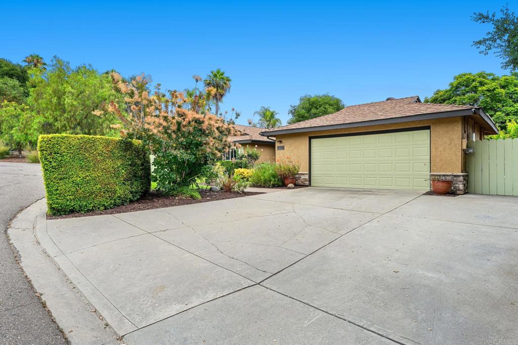3625 Laketree Drive Fallbrook, CA 92028 - Photo 51 of 52 a front view of a house with a garage