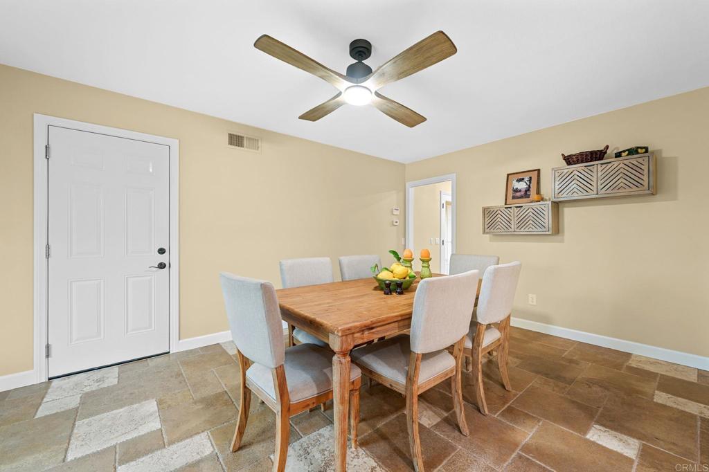 3625 Laketree Drive Fallbrook, CA 92028 - Photo 9 of 52 a view of a dining room with furniture