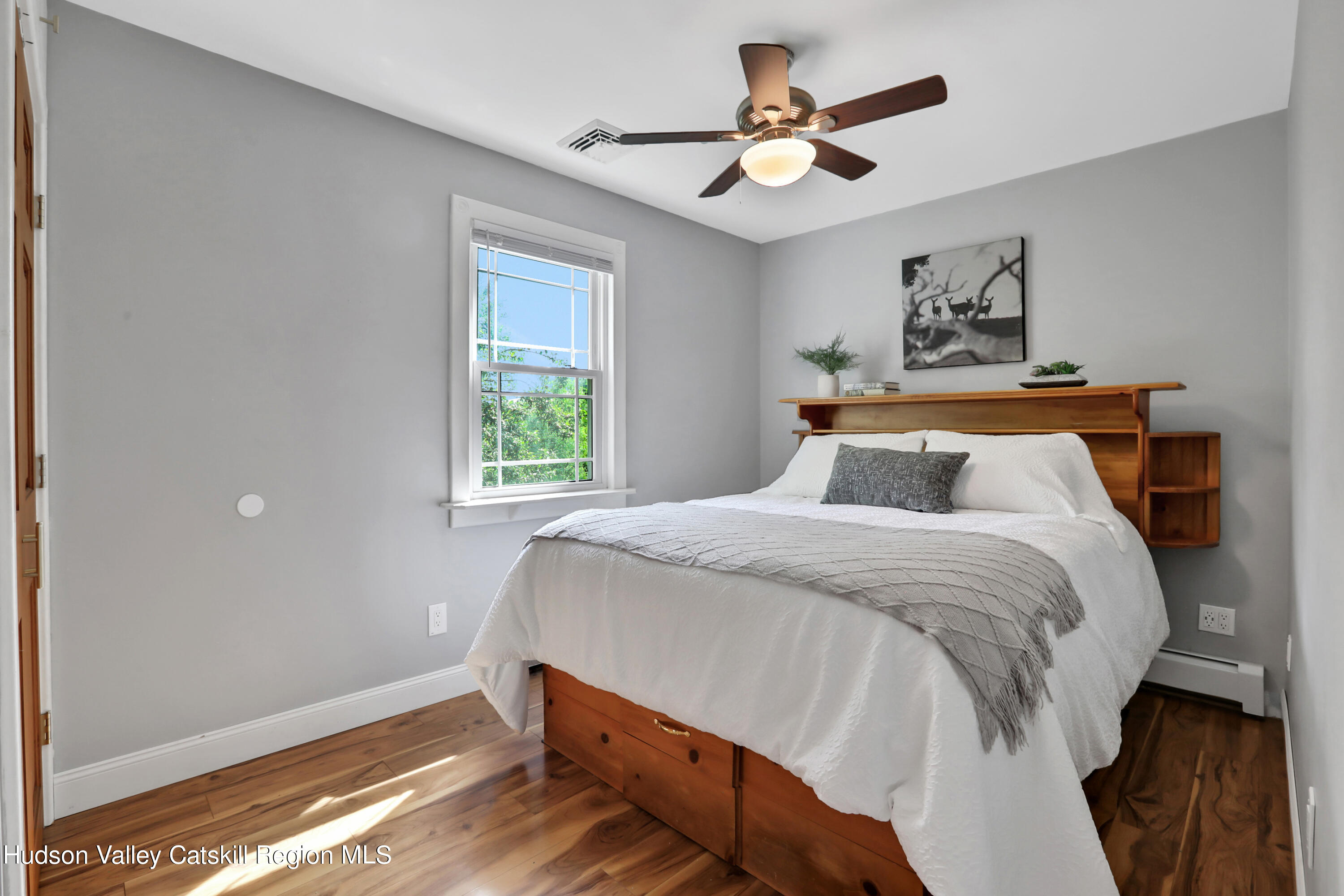 667 Albany Post Road New Paltz, NY 12561 - Photo 18 of 44 a bedroom with a bed and a window