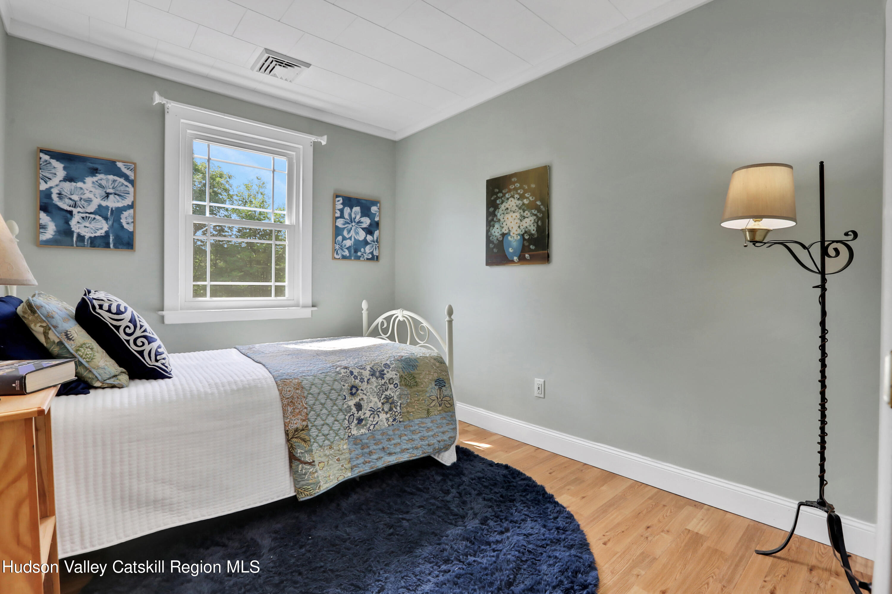 667 Albany Post Road New Paltz, NY 12561 - Photo 21 of 44 a bedroom with a bed and a window