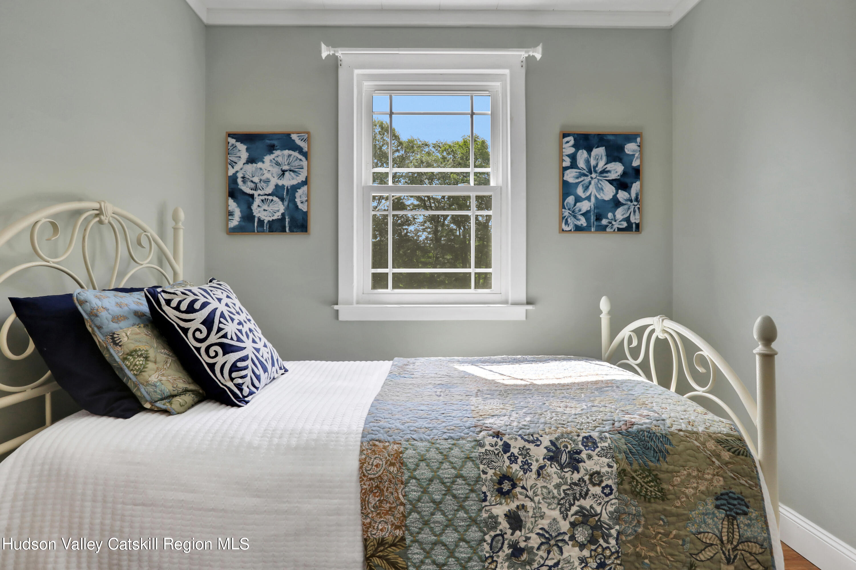 667 Albany Post Road New Paltz, NY 12561 - Photo 22 of 44 a bedroom with a bed and a window