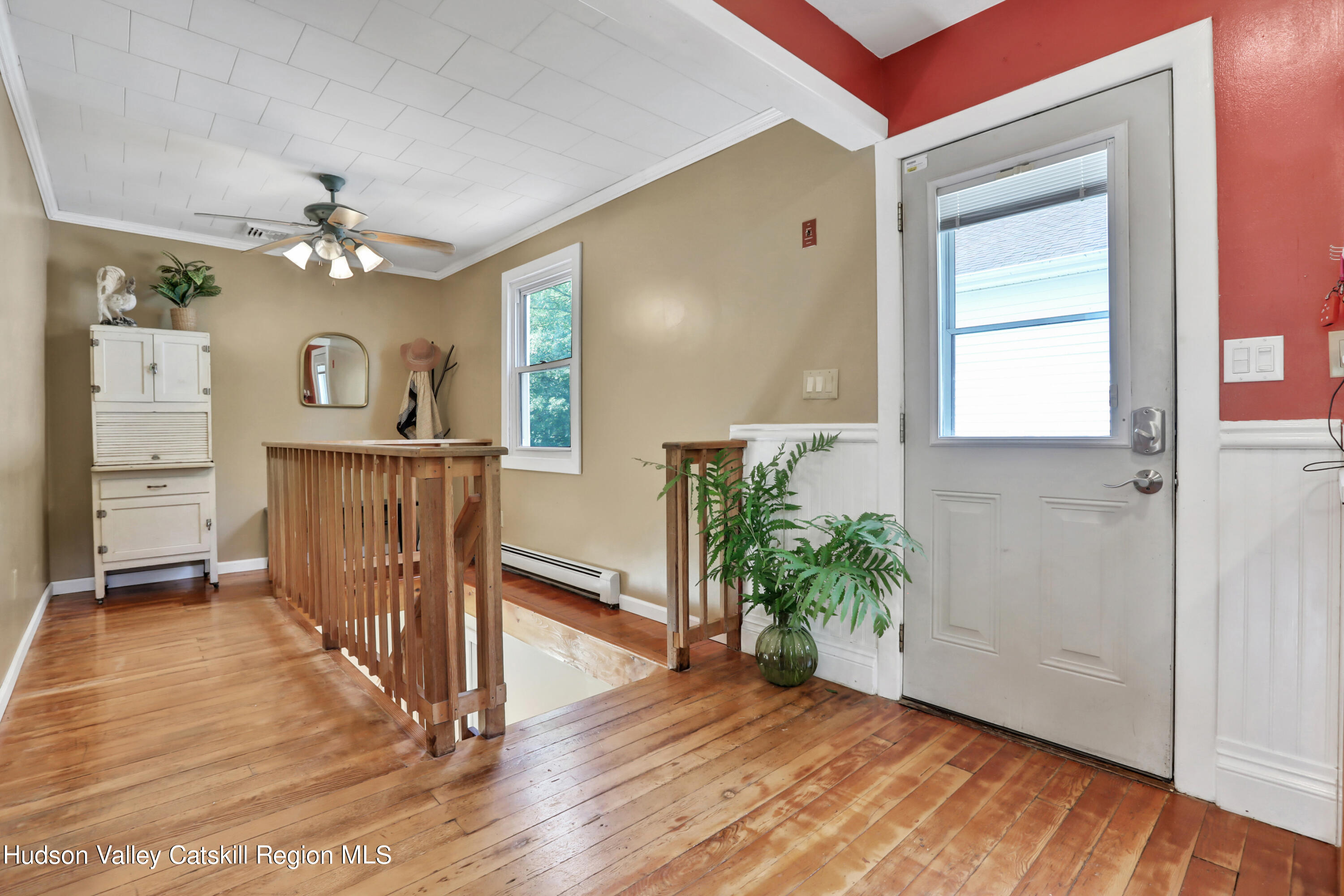 667 Albany Post Road New Paltz, NY 12561 - Photo 23 of 44 wooden floor in an empty room with a window and wooden floor