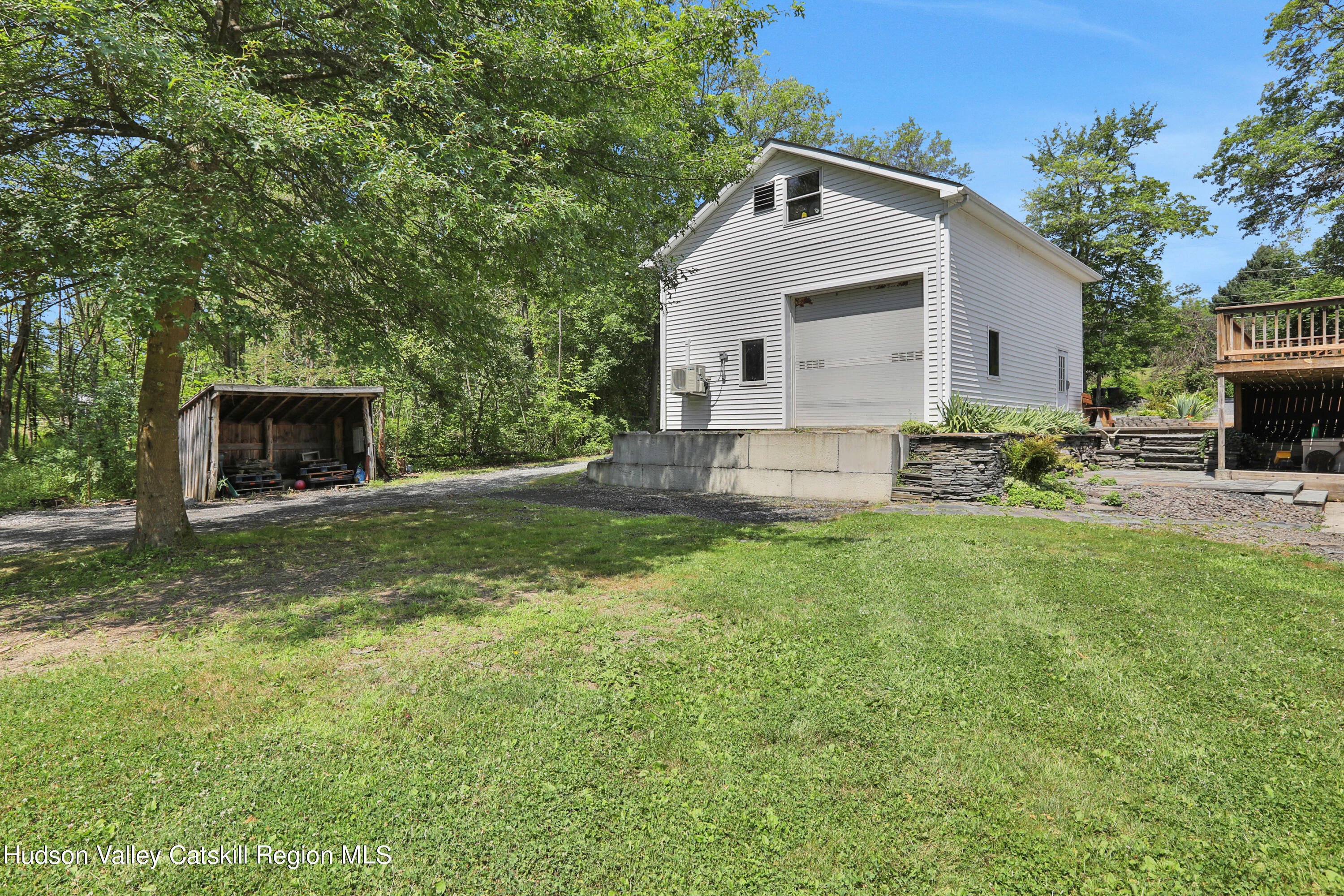 667 Albany Post Road New Paltz, NY 12561 - Photo 38 of 44 a view of a house with backyard and sitting area