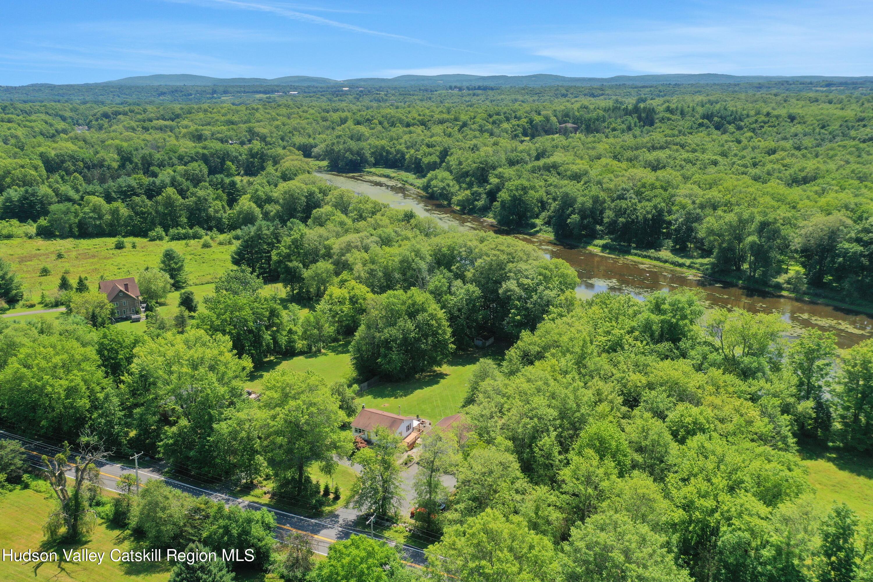 667 Albany Post Road New Paltz, NY 12561 - Photo 43 of 44 a view of a green field with lots of bushes
