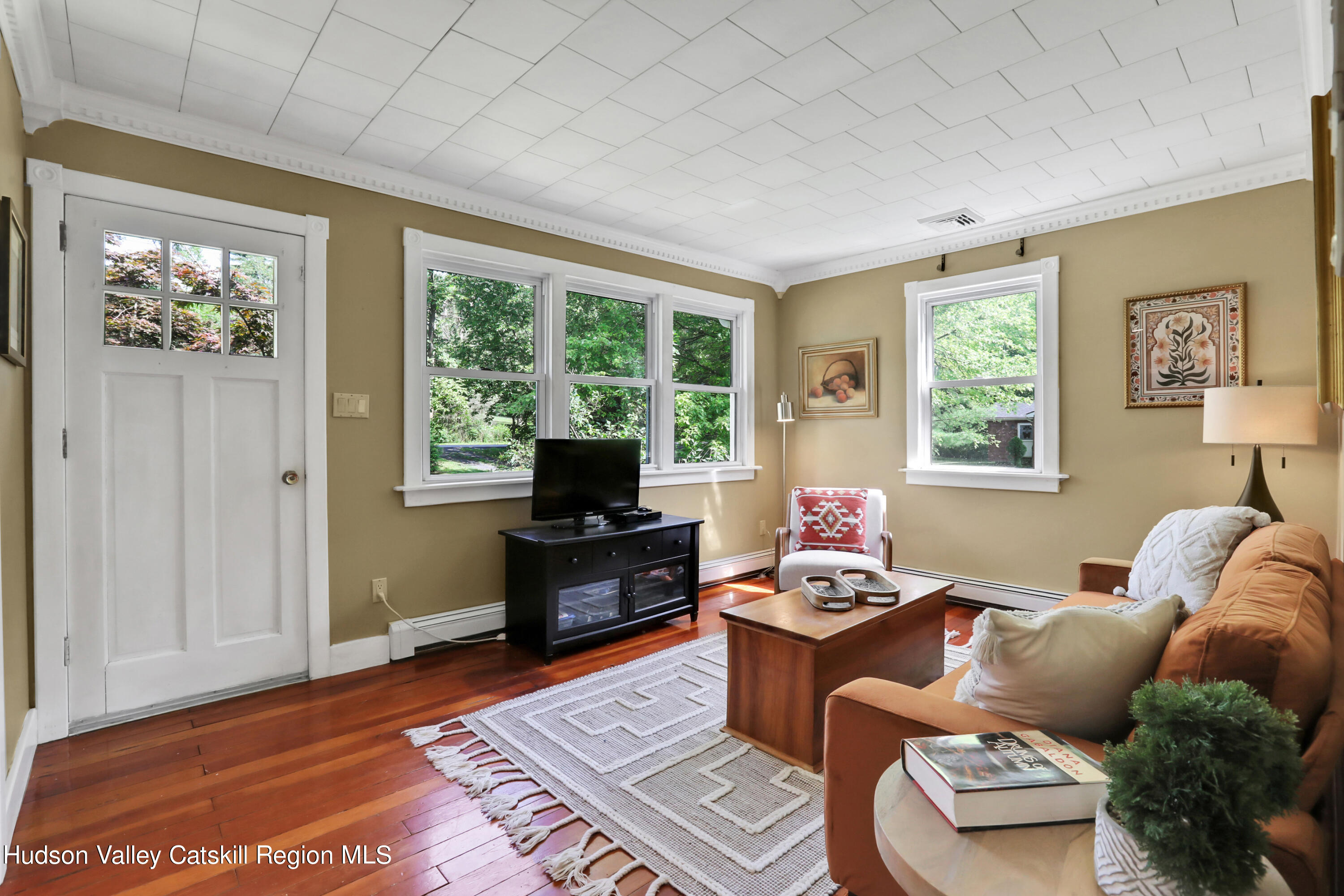 667 Albany Post Road New Paltz, NY 12561 - Photo 7 of 44 a living room with furniture and a window
