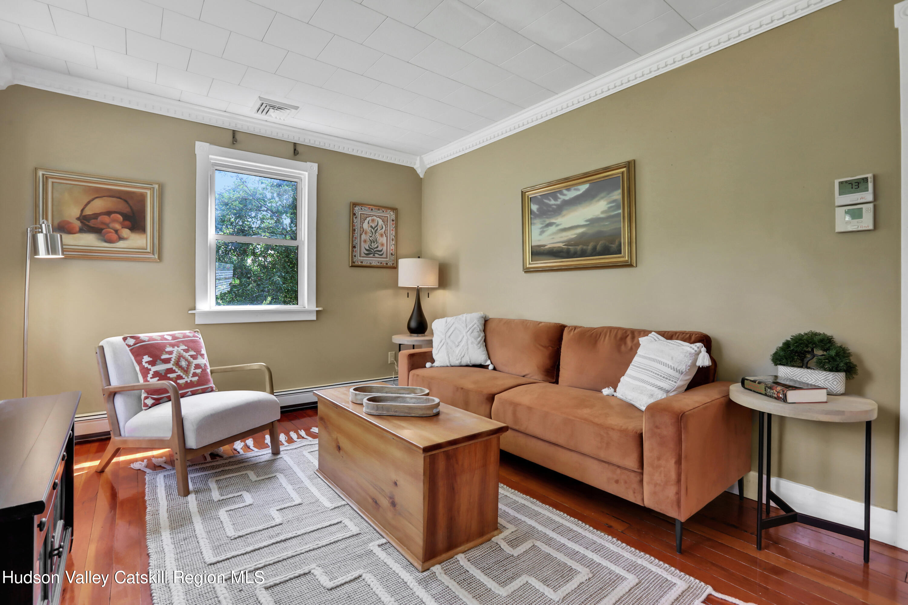 667 Albany Post Road New Paltz, NY 12561 - Photo 9 of 44 a living room with furniture and a window