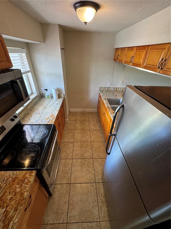 3121 Vasco Street, Unit 2 Punta Gorda, FL 33950 - Photo 8 of 17 a view of an empty room and wooden floor