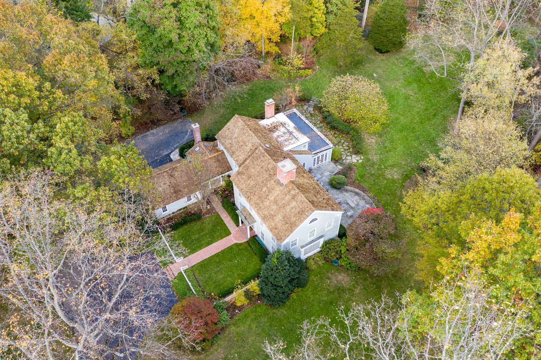 840 Hollow Tree Ridge Road Darien, CT 06820 - Photo 1 of 27 an aerial view of a house with a yard