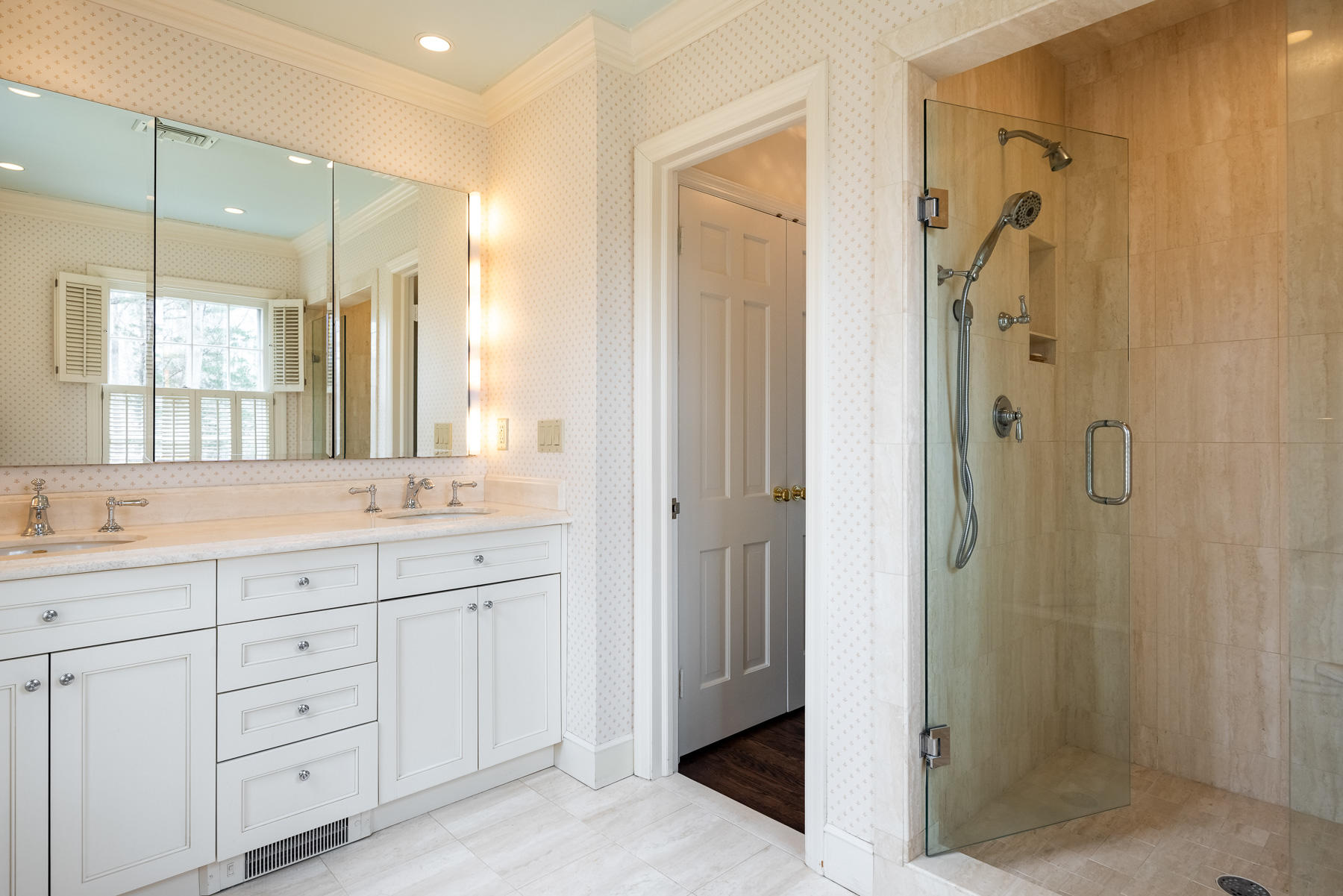 840 Hollow Tree Ridge Road Darien, CT 06820 - Photo 20 of 27 a bathroom with a shower sink and mirror