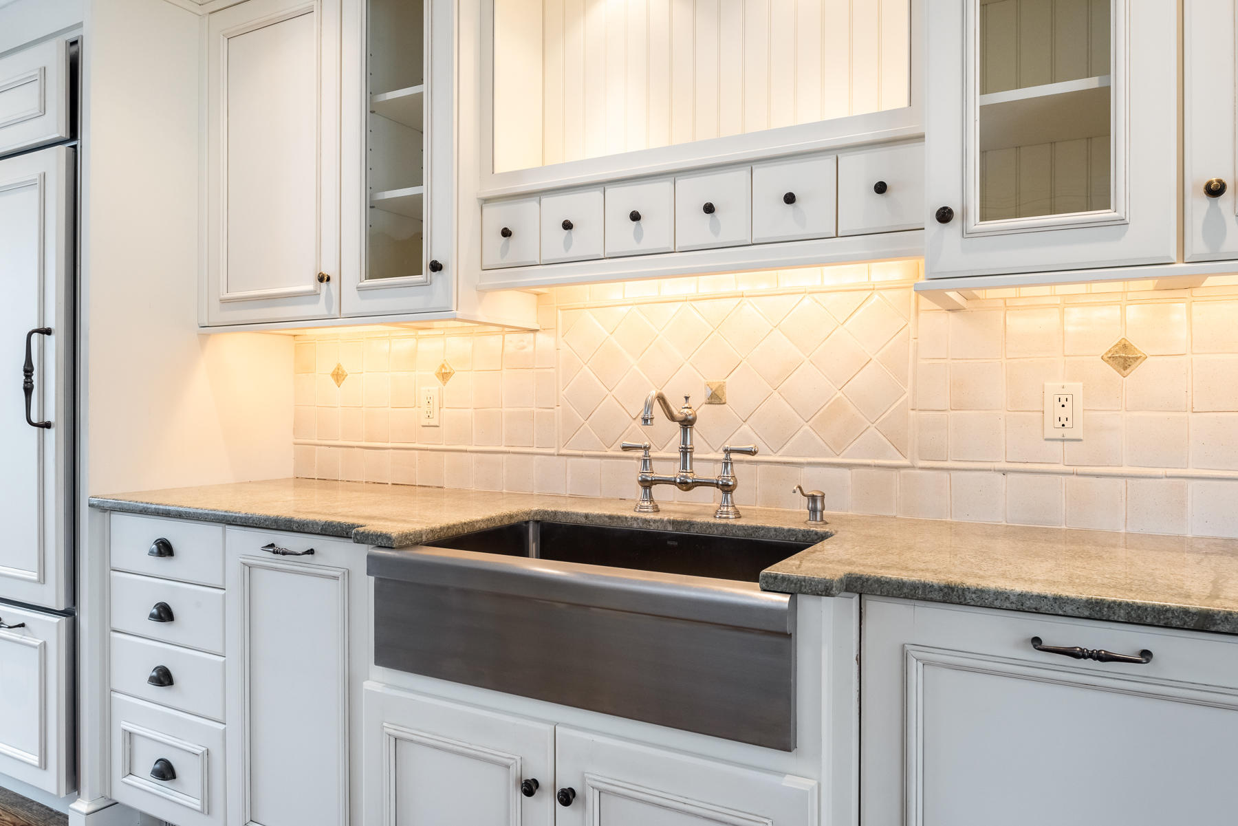 840 Hollow Tree Ridge Road Darien, CT 06820 - Photo 9 of 27 a kitchen with granite countertop a sink and a cabinets