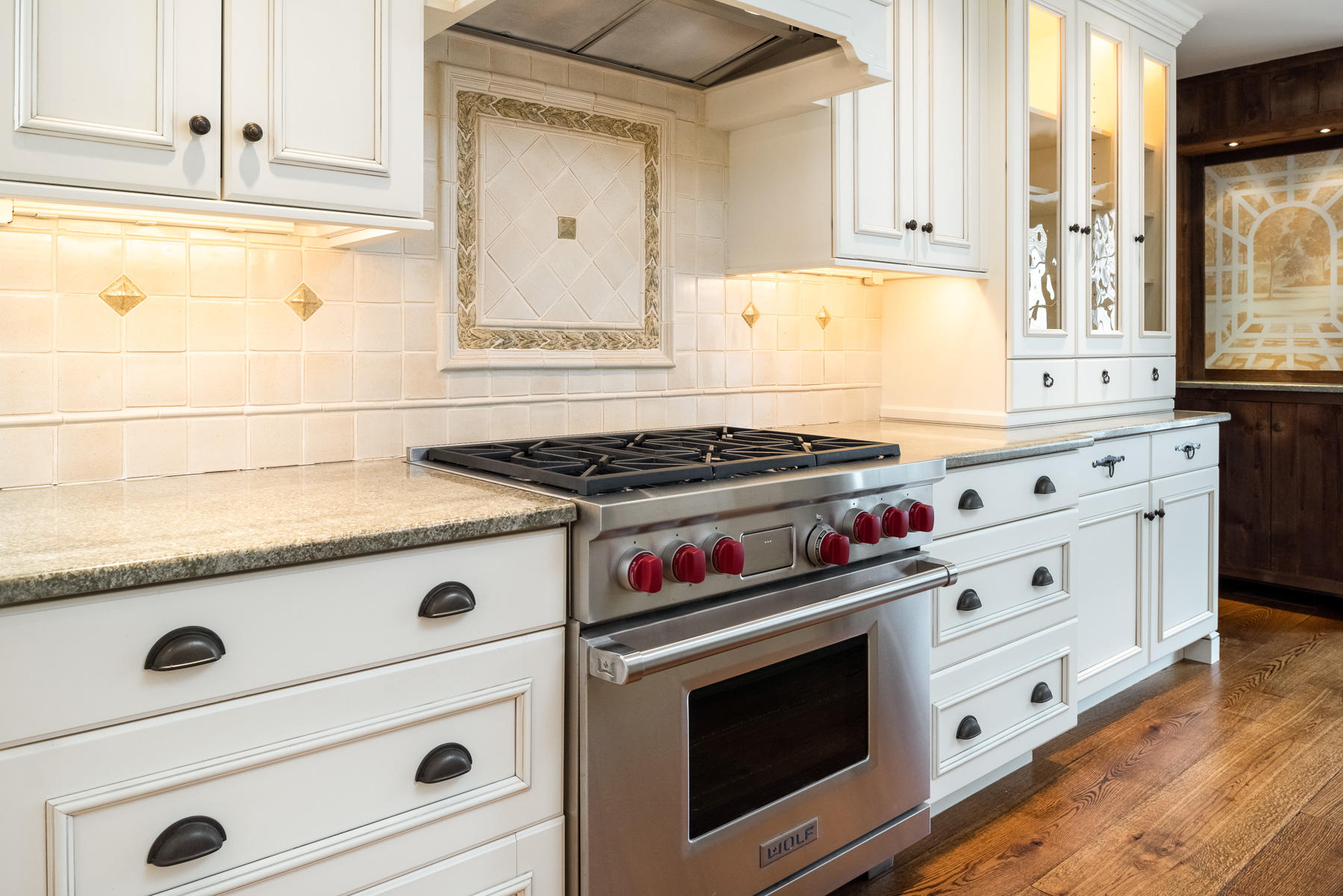 840 Hollow Tree Ridge Road Darien, CT 06820 - Photo 10 of 27 a kitchen with granite countertop white cabinets and white appliances
