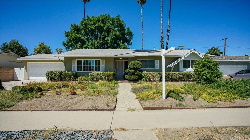 3509 Royal Avenue Simi Valley, CA 93063 - Photo 1 of 1 a front view of a house with a yard