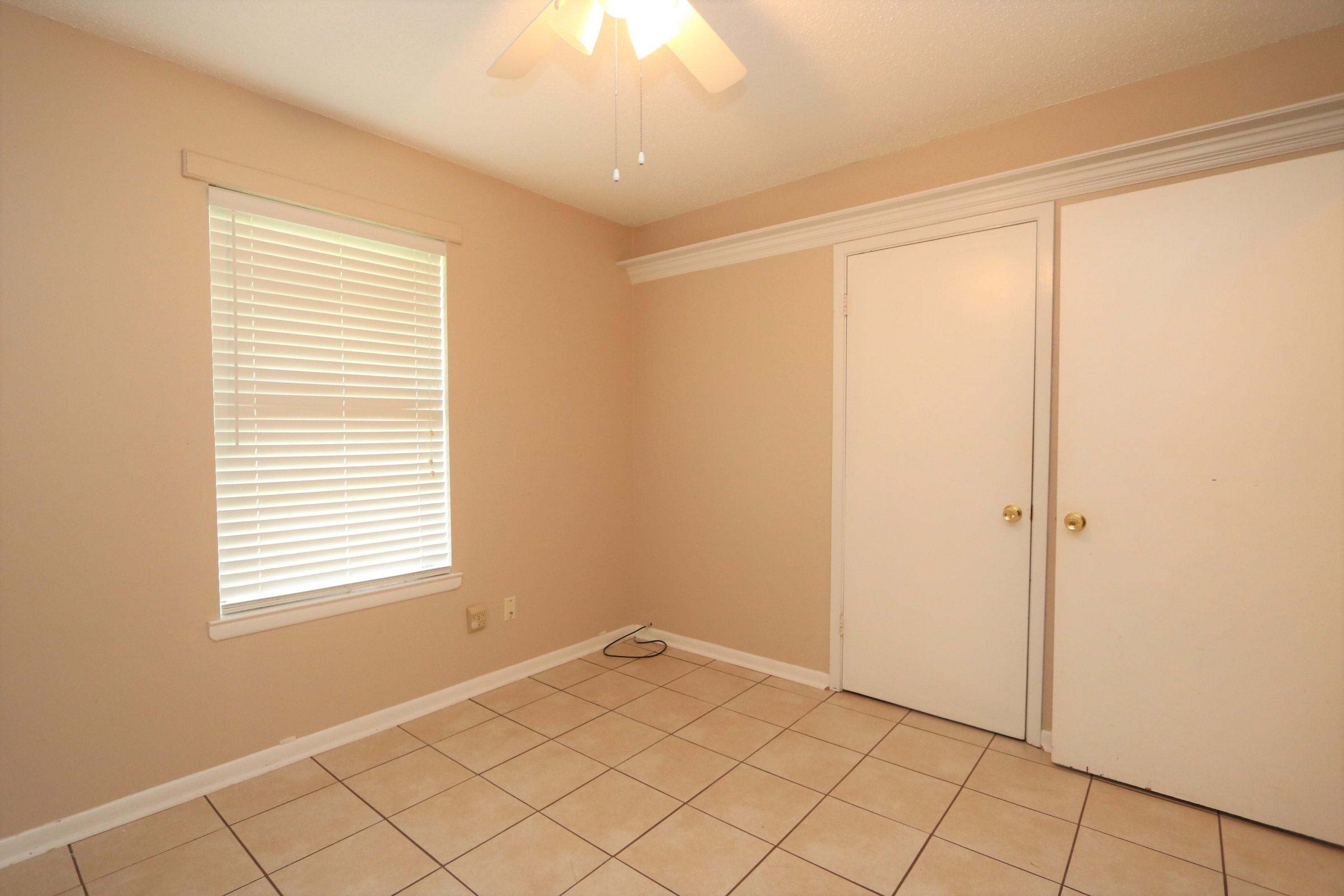 3097 Bay Ridge Drive Crestview, FL 32539 - Photo 11 of 21 a view of an empty room and window