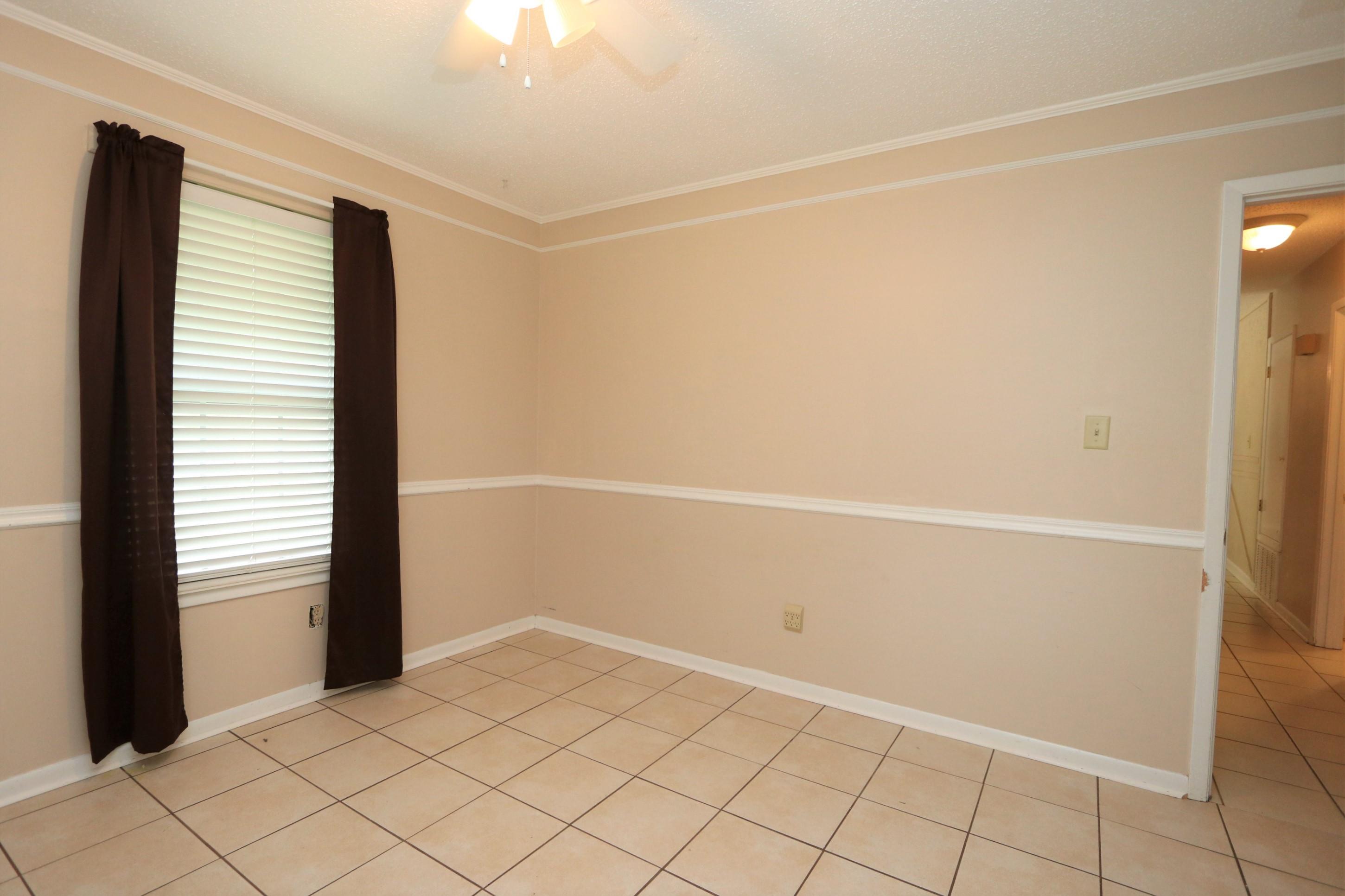 3097 Bay Ridge Drive Crestview, FL 32539 - Photo 13 of 21 an empty room with windows