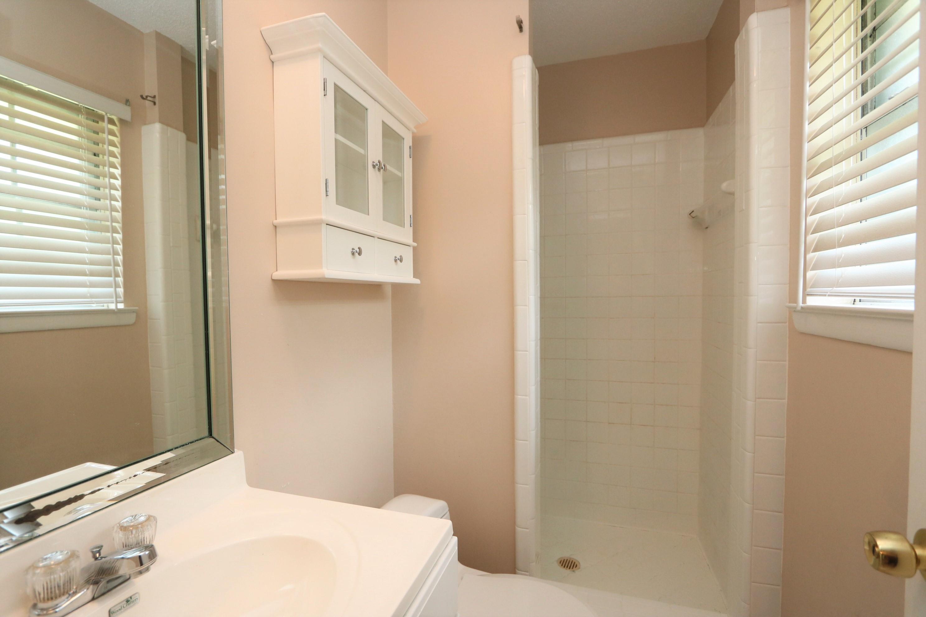 3097 Bay Ridge Drive Crestview, FL 32539 - Photo 16 of 21 a bathroom with a bathtub and shower