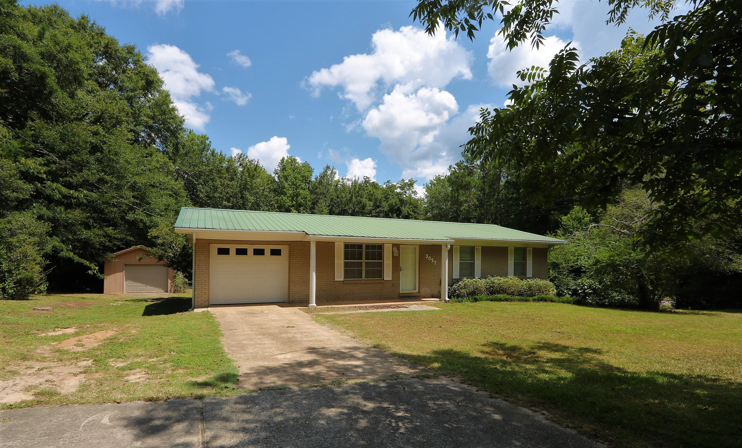 3097 Bay Ridge Drive Crestview, FL 32539 - Photo 2 of 21 a view of a house with a backyard