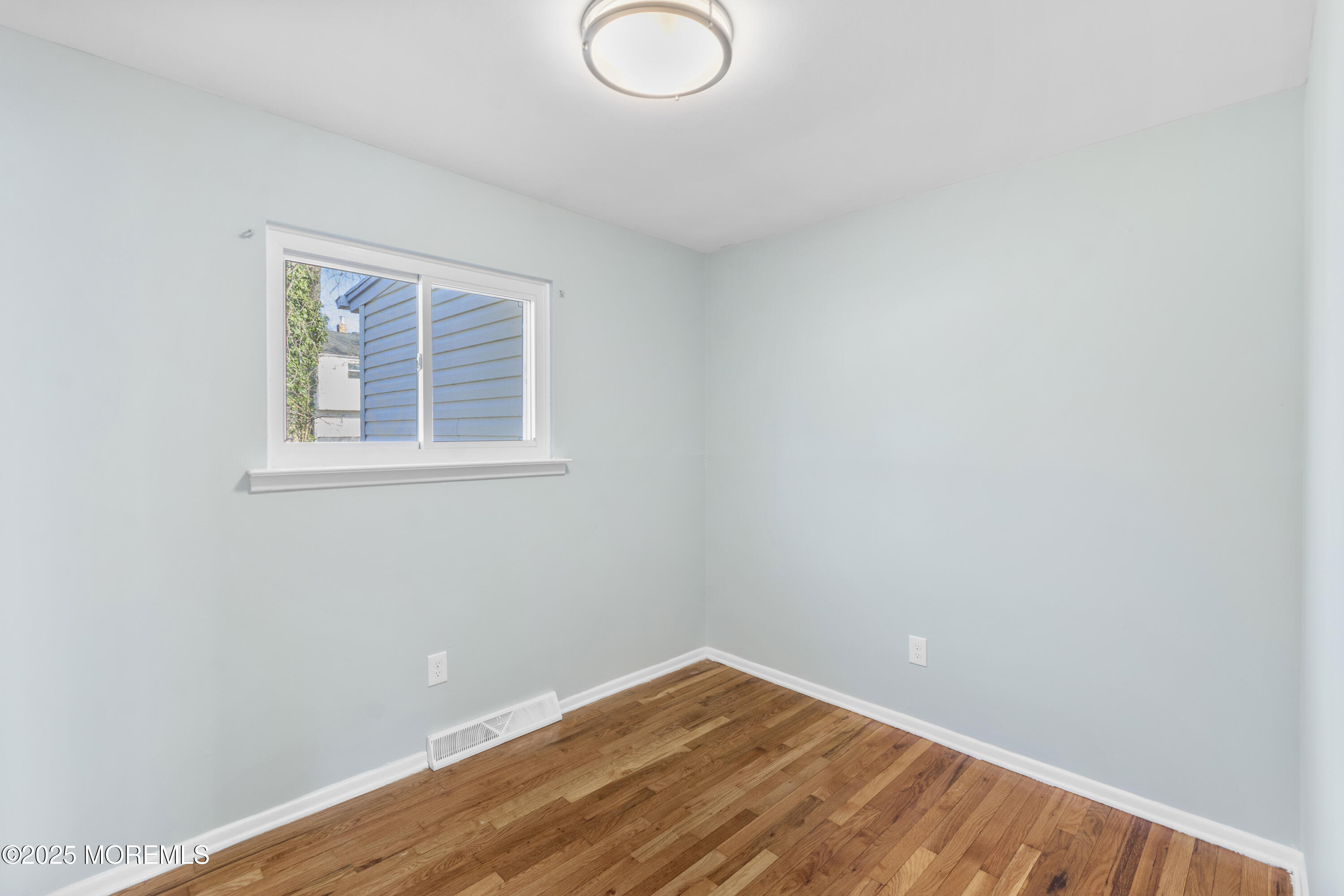 85 Helen Avenue Freehold, NJ 07728 - Photo 15 of 19 an empty room with a window