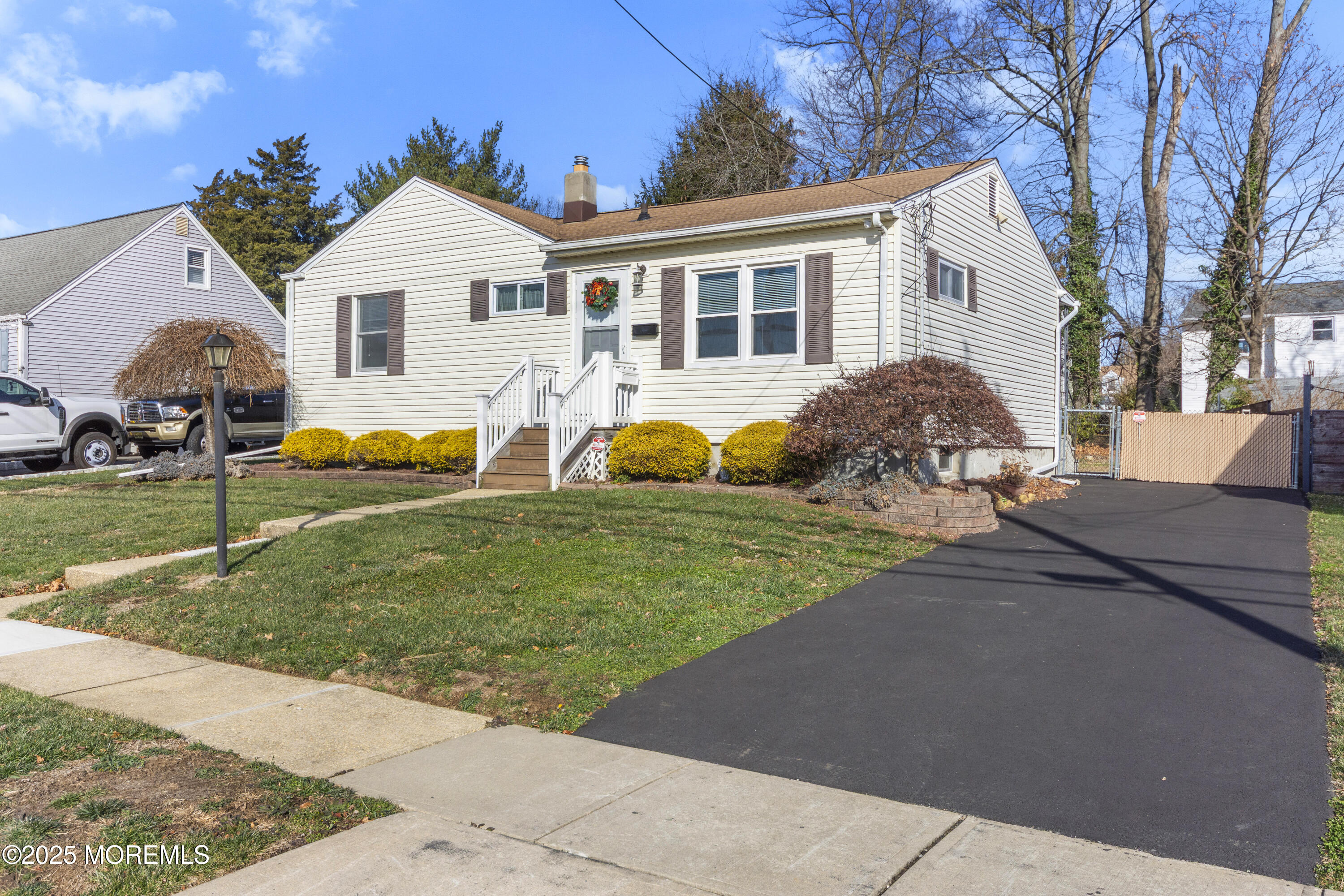85 Helen Avenue Freehold, NJ 07728 - Photo 19 of 19 a front view of house with yard and green space